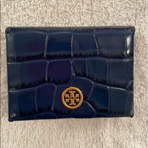 Tory Burch blue embossed foldable credit card case.  Never used